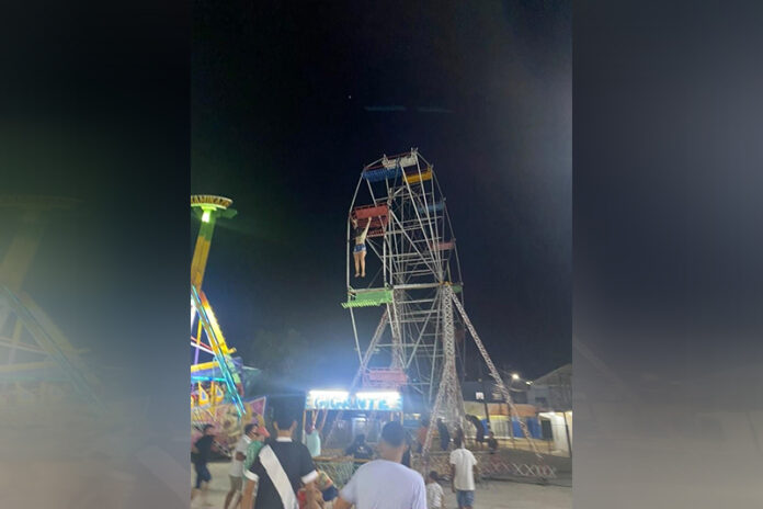 Uma menina de 11 anos ficou pendurada e depois caiu de uma roda gigante em um parque de diversões em Rio Preto da Eva